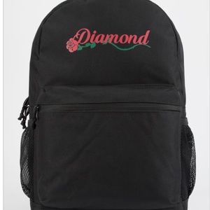 This backpack has a diamond rose pattern